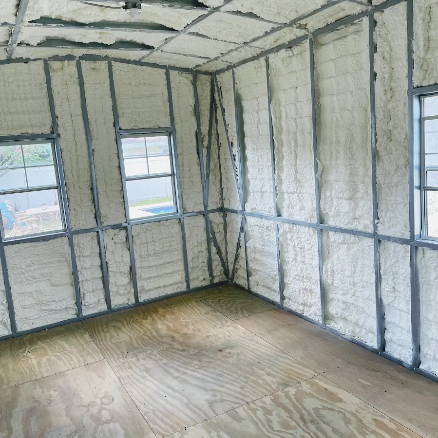 Closed-cell spray foam insulation applied to wall cavities in a residential project in Albuquerque